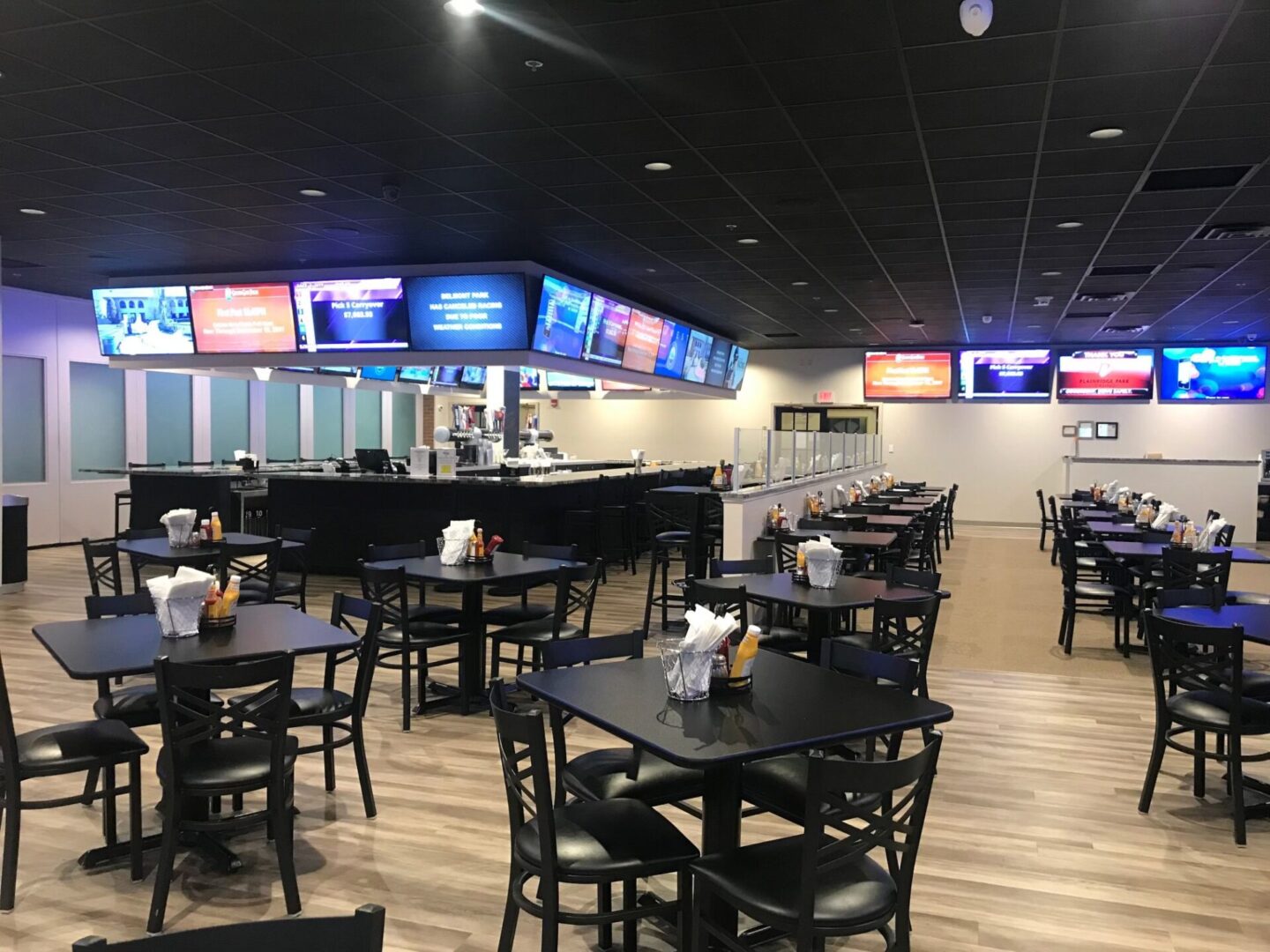 A restaurant with tables and chairs in it